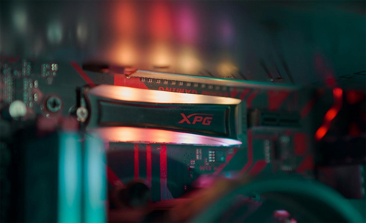 Close-up of an XPG SSD (solid state drive) inside a computer.